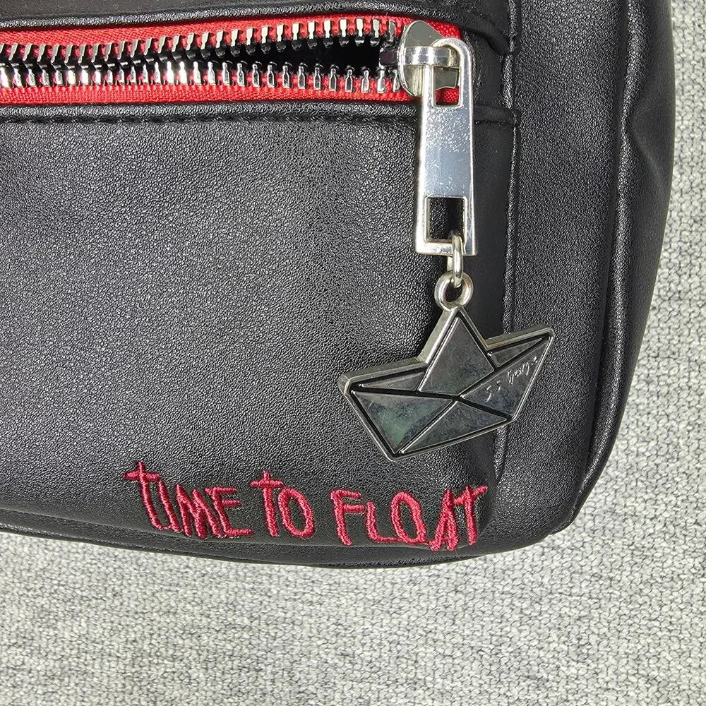 IT CHAPTER TWO PENNYWISE BACKPACK – “TIME TO FLOAT” – BLACK/RED – HOT TOPIC